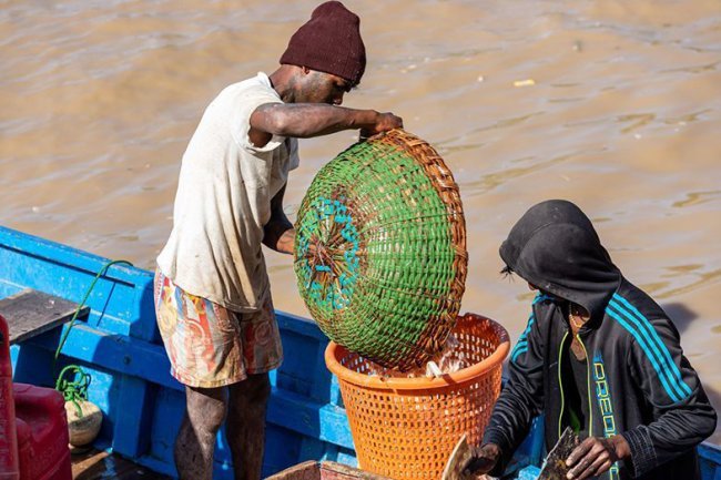 Finance Minister Urges Fisherfolk to Leverage Government Schemes for Business Growth