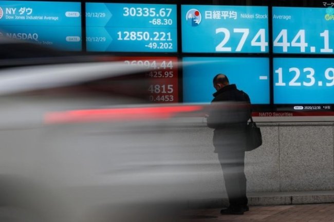 Asian Stocks Rally, European Futures Climb on PBOC Stimulus Measures