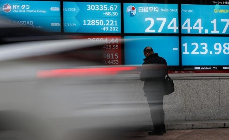 Asian Stocks Rally, European Futures Climb on PBOC Stimulus Measures